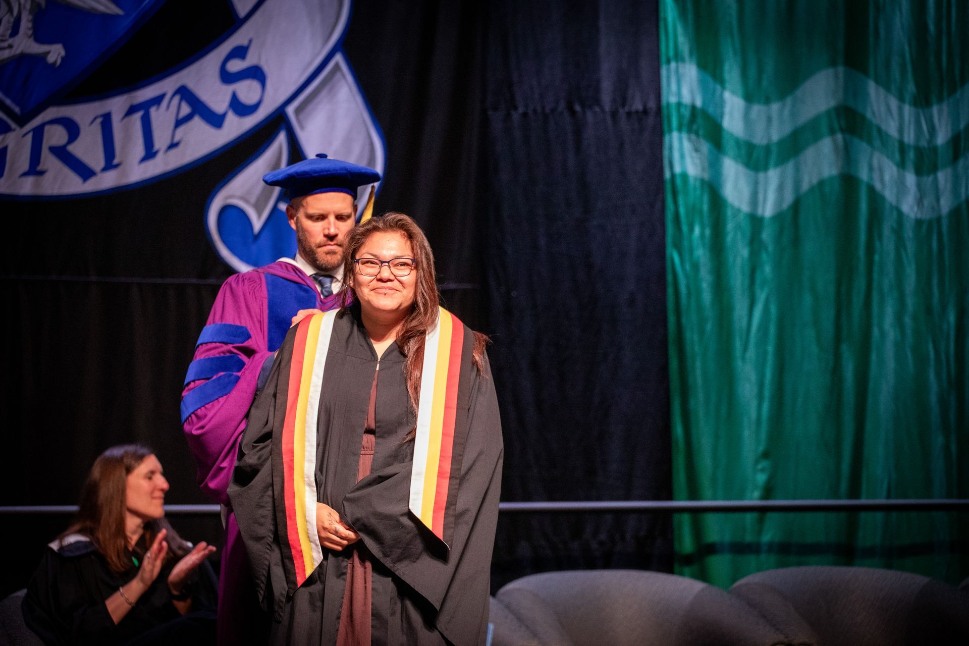 Nipissing University graduate posing for a picture