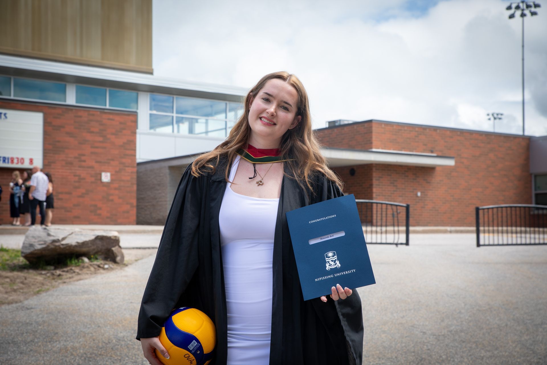 Nipissing University graduate posing for a picture