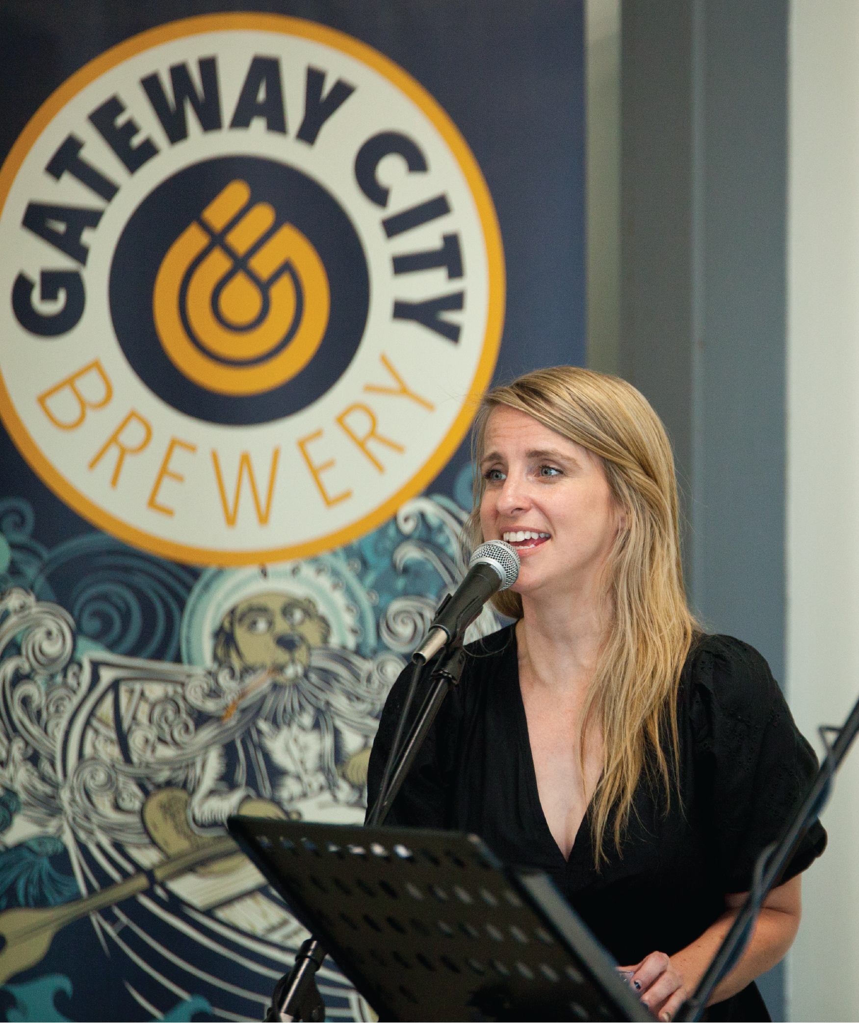 A performer singing at the Gateway City Brewery