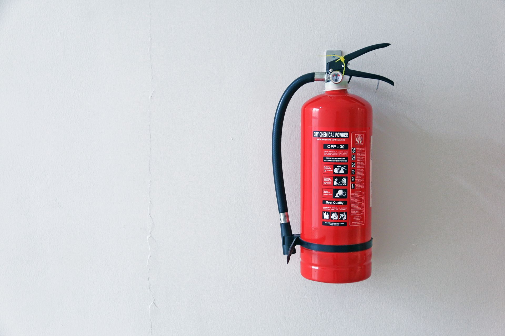 A fire extinguisher mounted on the wall
