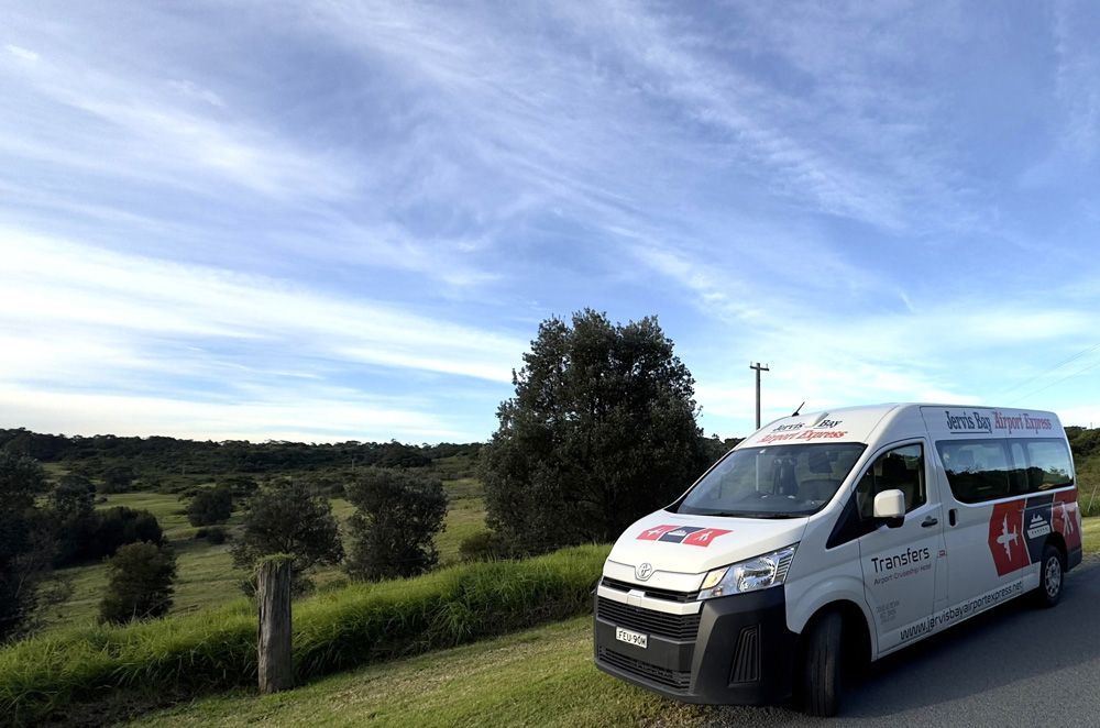Van for Airport Transfers Along the Rural Road