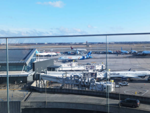 An aerial view of an airport with a sign that says jetstar