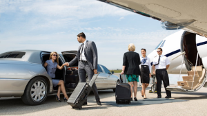 A group of people are boarding a private jet.
