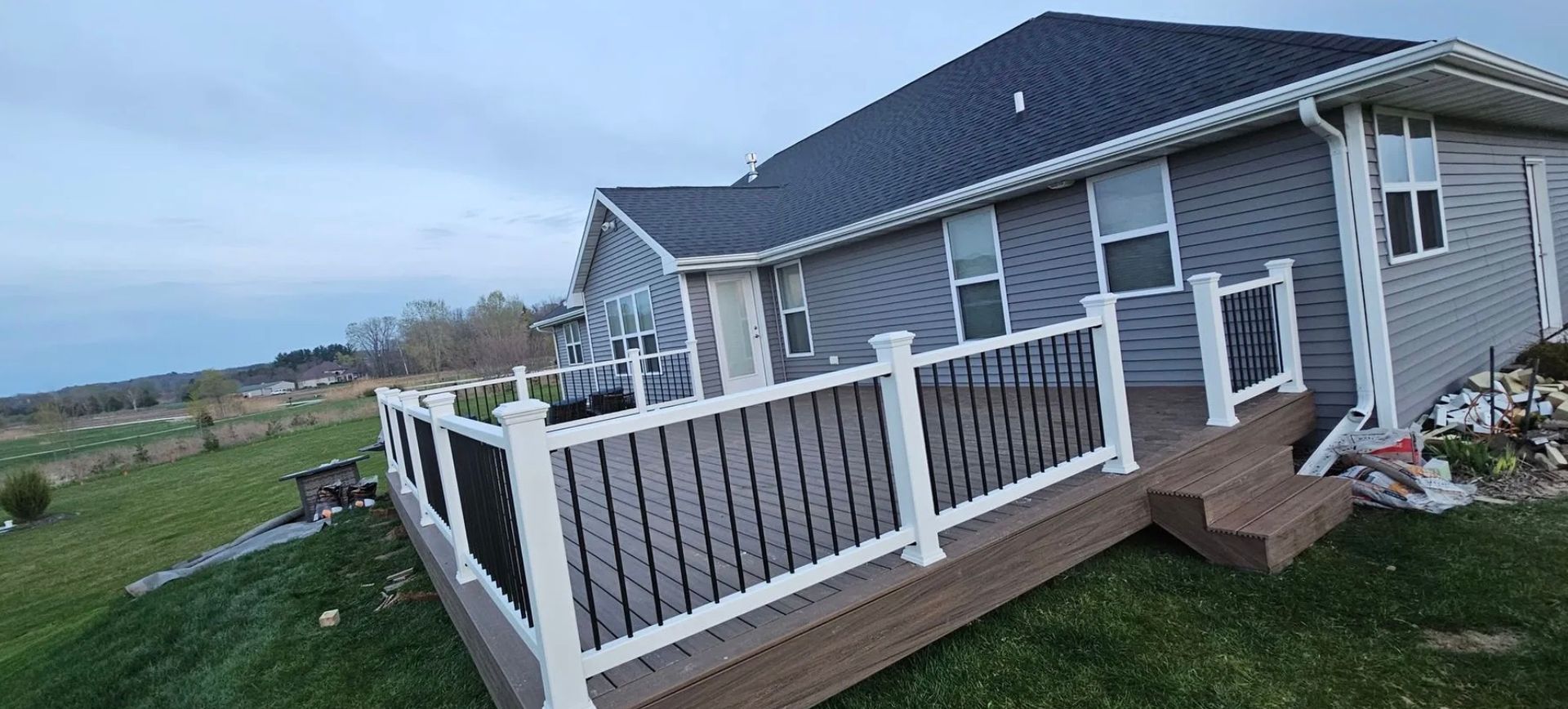 A finished deck installation in Pulaski, WI - deck built by Alley Remodeling.