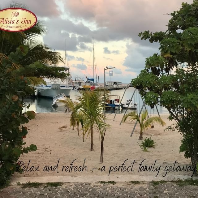 A sign that says relax and refresh a perfect family getaway