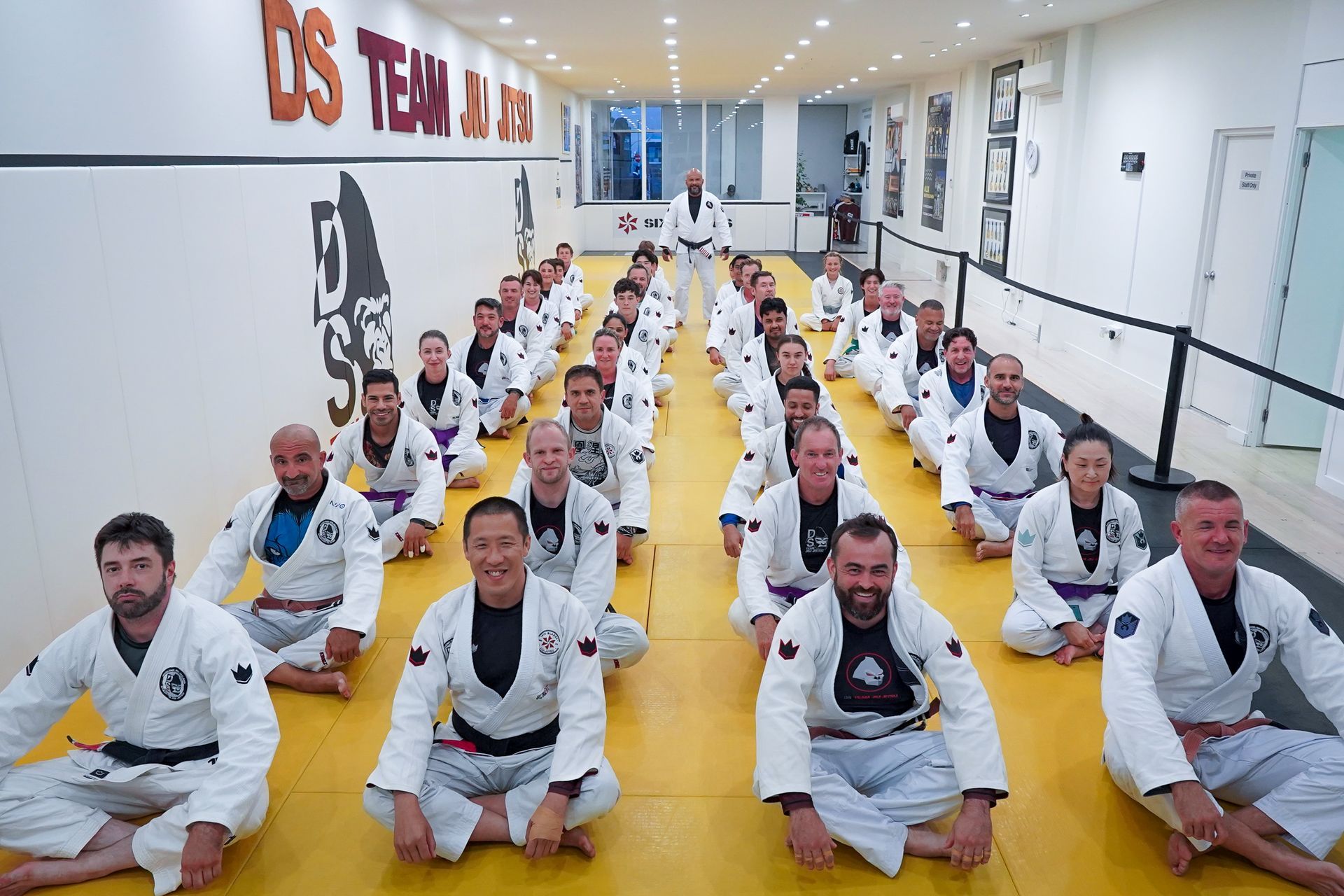 Jiu-Jitsu athlete in dark training hall