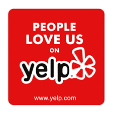 A red sign that says `` people love us on yelp ''