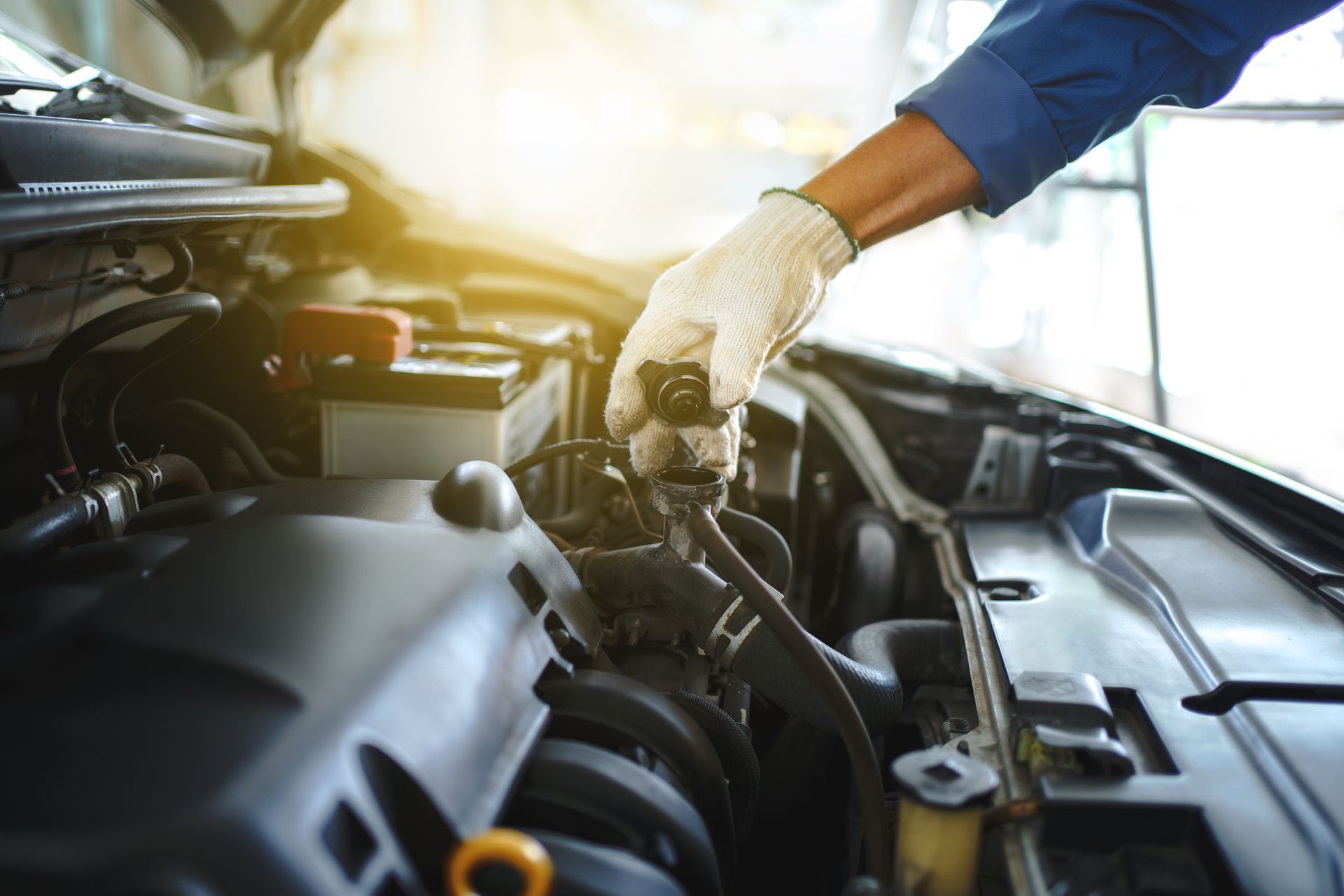 Mechanic Checks the Water Level in the Radiator — Grand Prairie, TX — MMRS