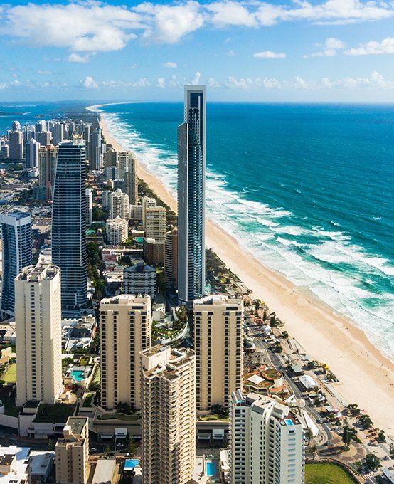 Modern Aerial Cityscape of Resort Town and Beach — Safe N Sound Locksmiths in Varsity Lakes, QLD