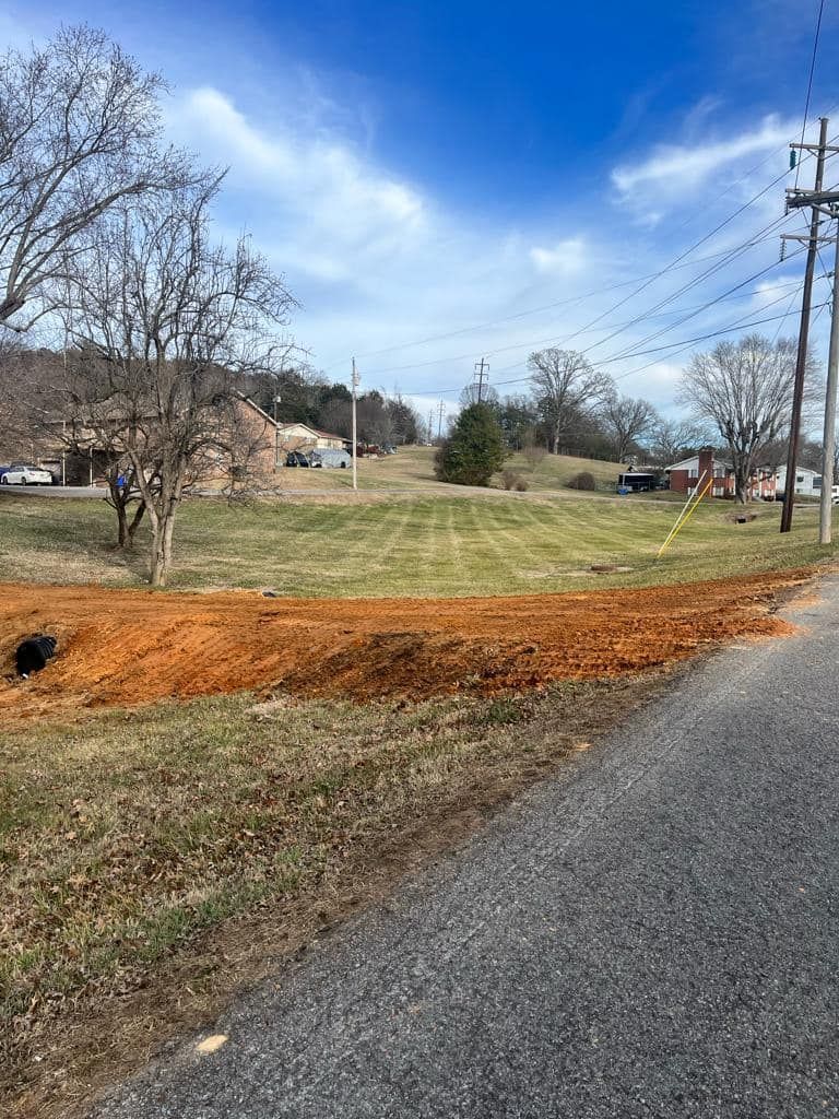 There is a lot of dirt on the side of the road.