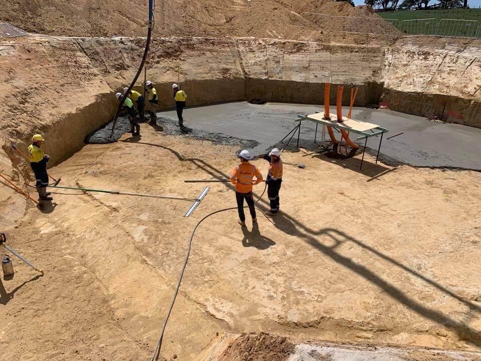 Pouring Concrete In Hole - Concreting in Southern Highlands, NSW