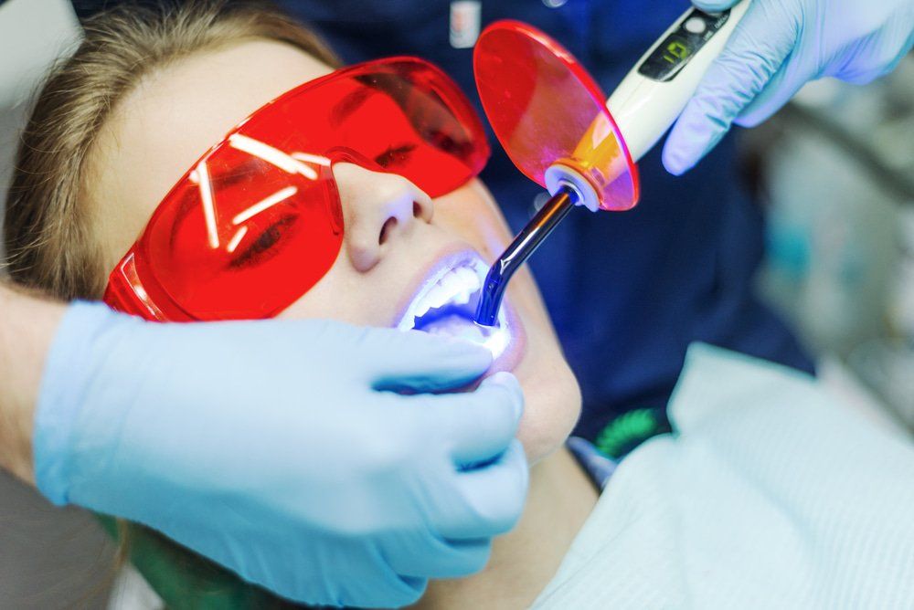 Woman Visiting Dentist In Clinic For Treatment — Laser Dentistry in Newcastle, NSW