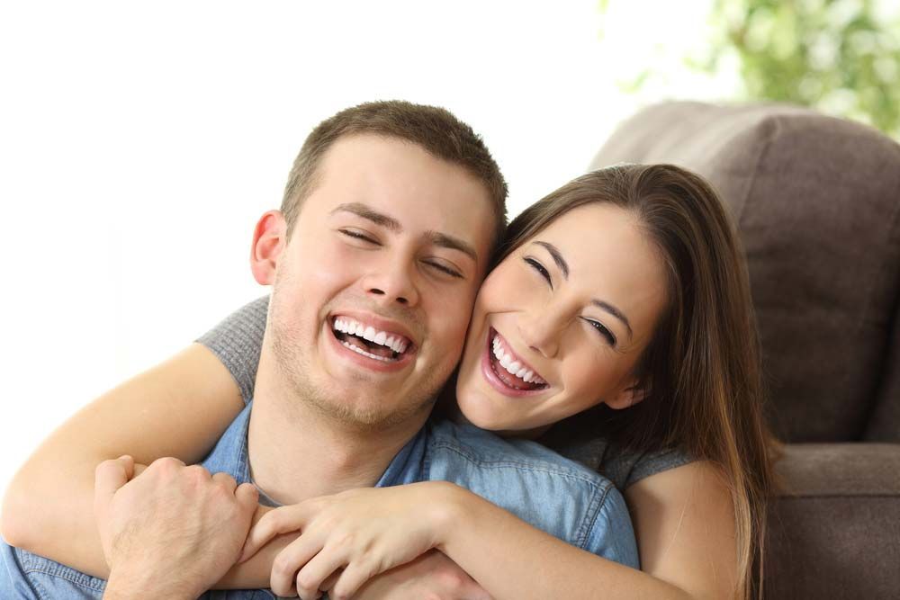 Happy Couple With Big Smiles — Dentist in Newcastle, NSW