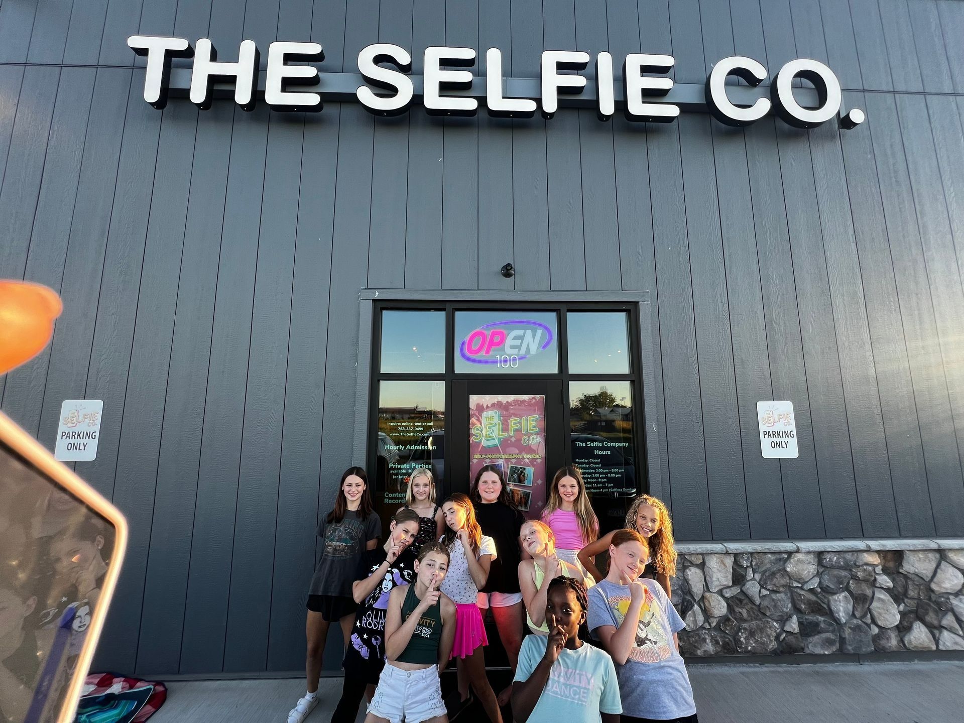 Group of people posing for a picture together.