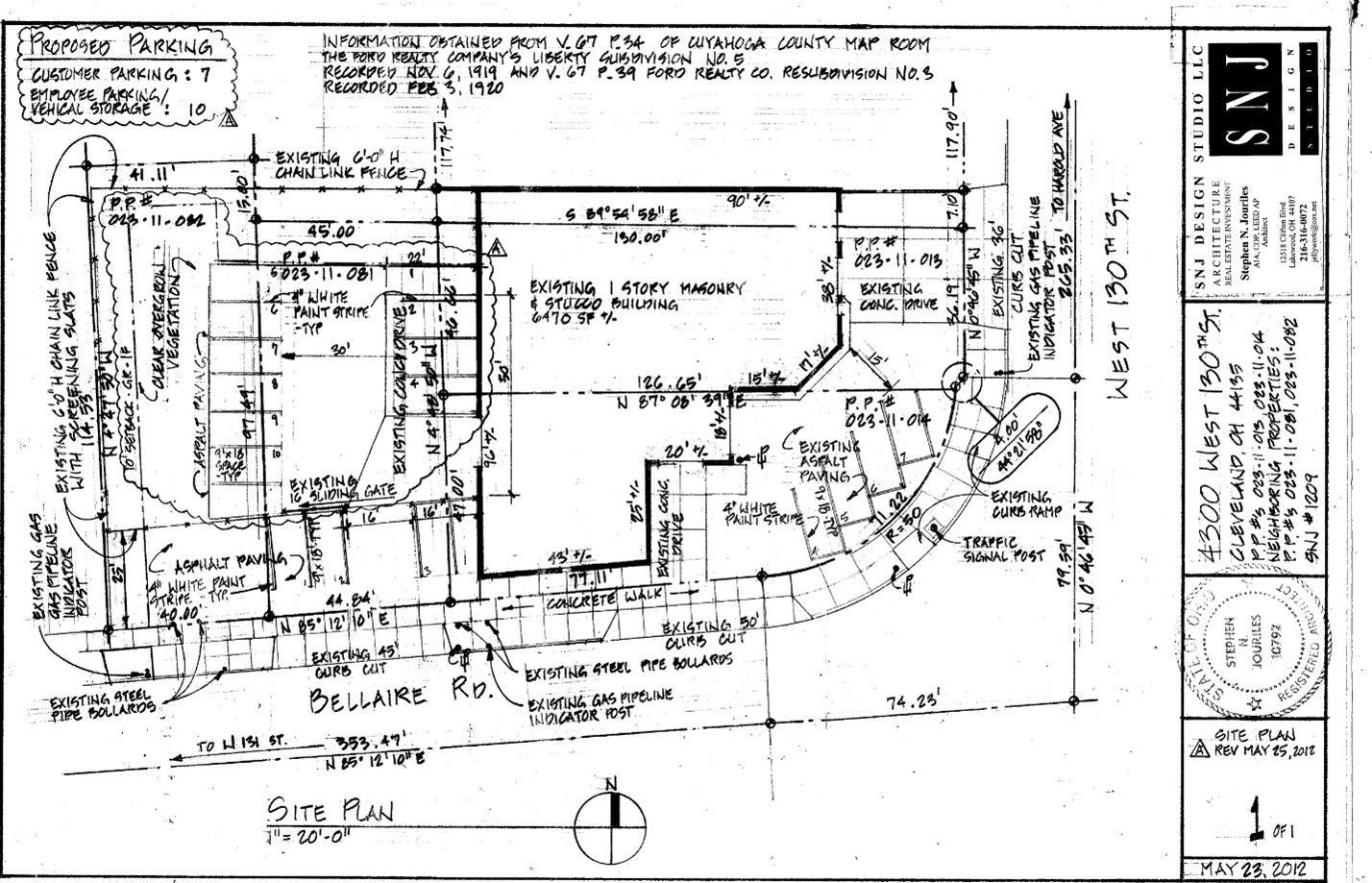Architectural plan with text and diagrams of a building layout. Includes dimensions, labels, and north arrow.