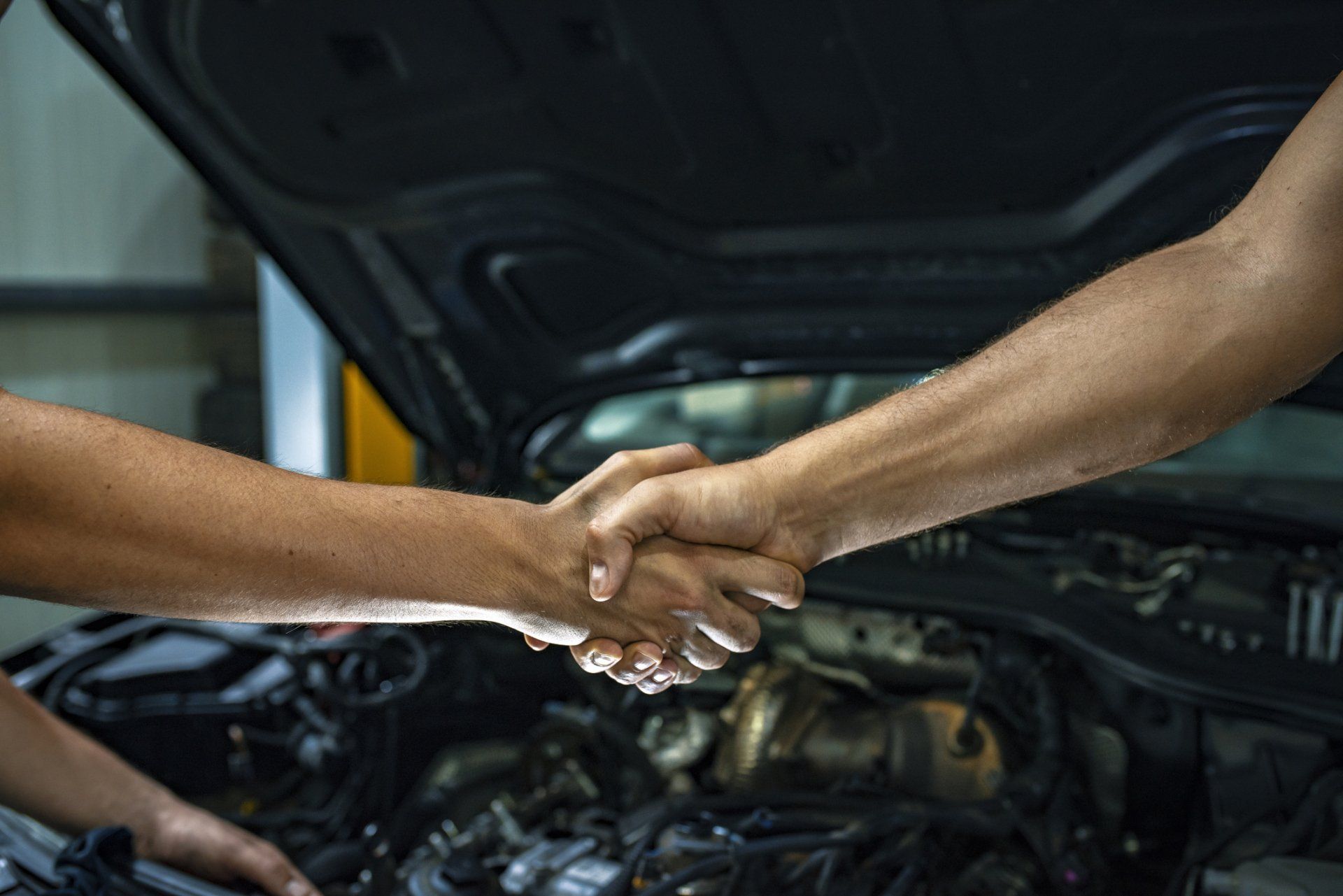Mechanic Handshakes Customer — Geelong, VIC — Norlane Tyre Service