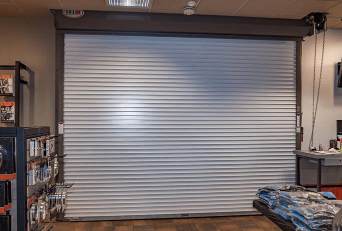 A garage door is open in a store.