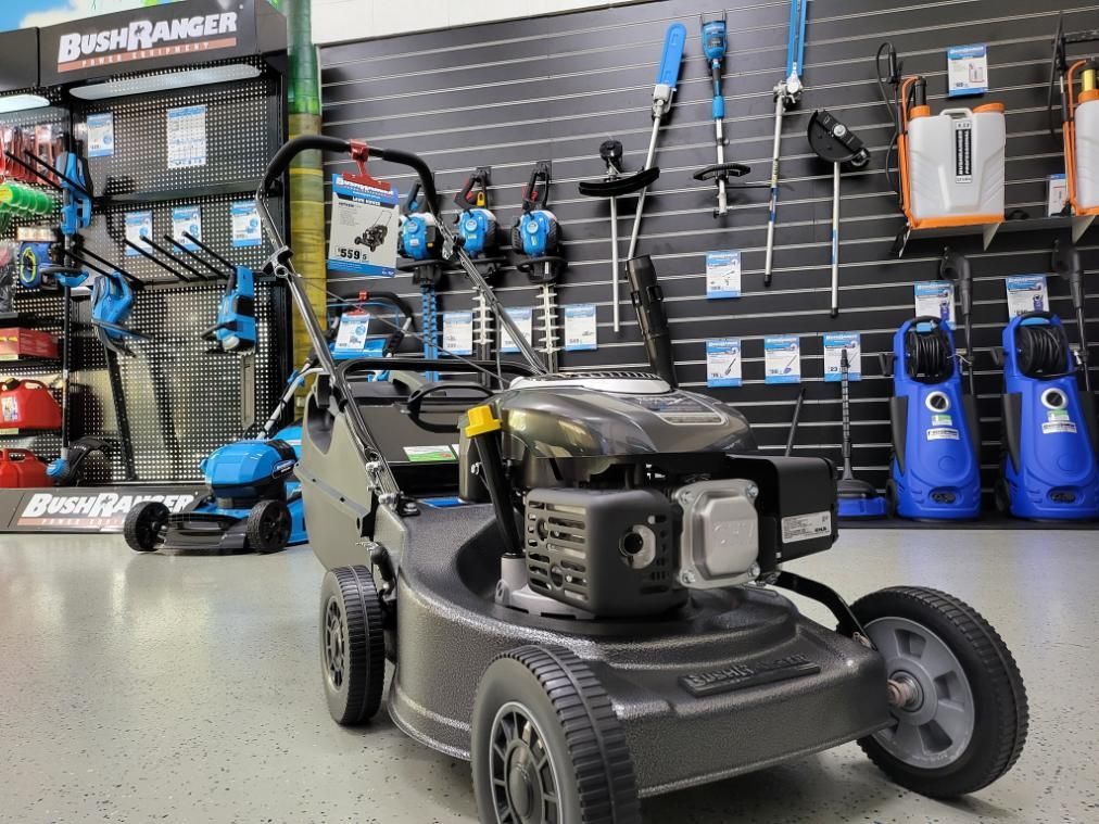 A Lawn Mower Is Parked In A Store — Cairns Mower City In Parramatta Park, QLD