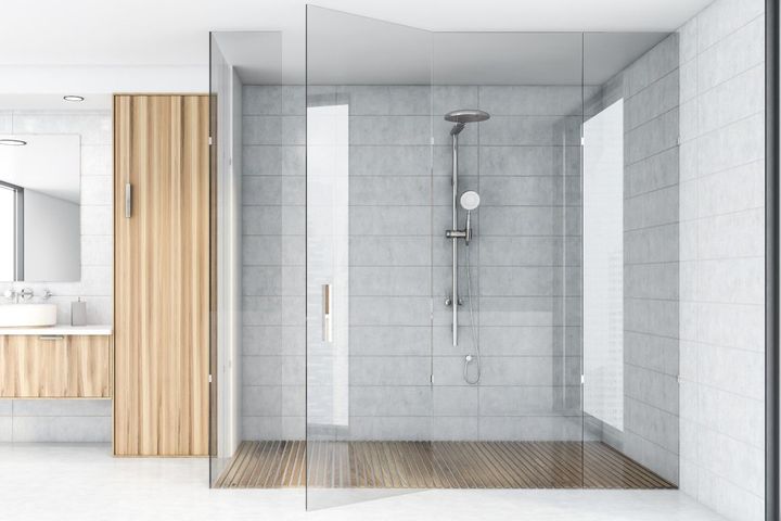 wood and tile mixed use in large walk in shower