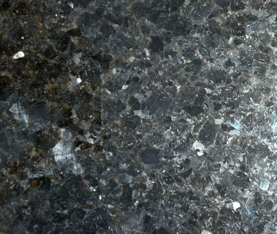 A black granite slab with a yellow star on it