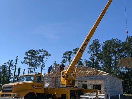 Mobile Hydraulic Crane on Grassland — Daytona Beach, FL — Bryson Crane Rental Service LLC