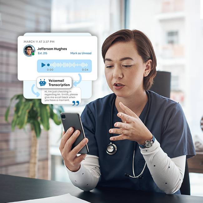 Medical professional using a phone with a voice transcript; indoors, sunny setting.