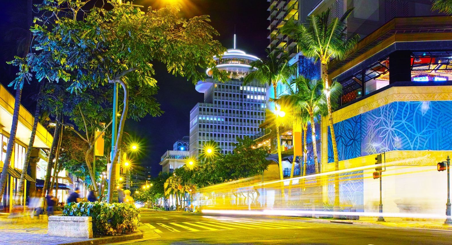 Night view of main street Hawaii, Waikiki where economic nexus is used