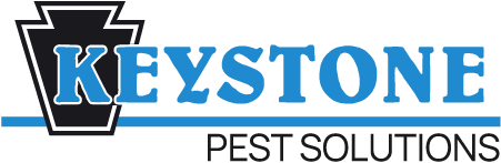 the logo for keystone pest solutions is blue and black .