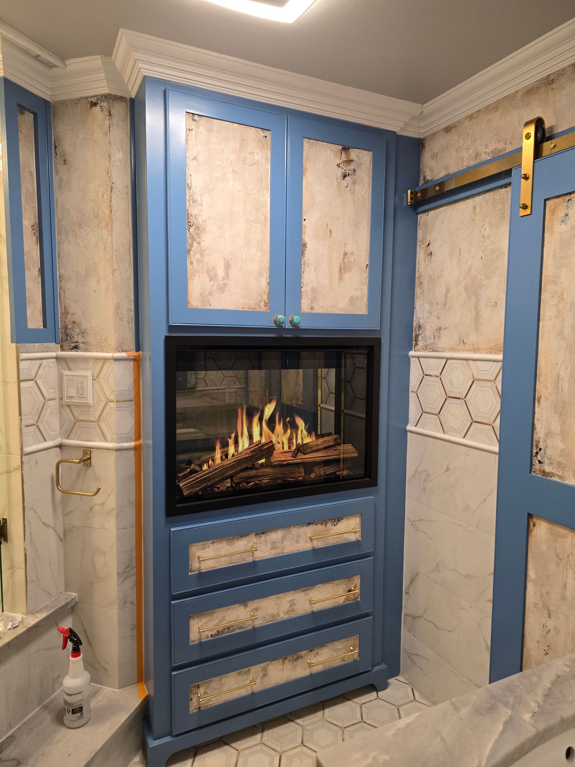 Close-up of unfinished light-colored wooden planks arranged at an angle, showing wood grain.