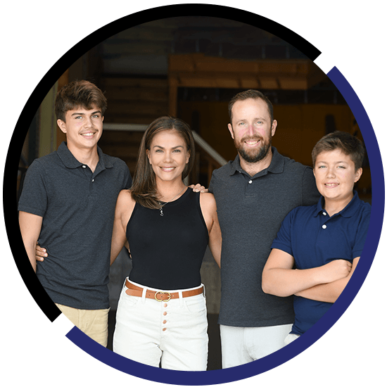 Family of the owner's of Venture Plumbing posing for a picture in a circle