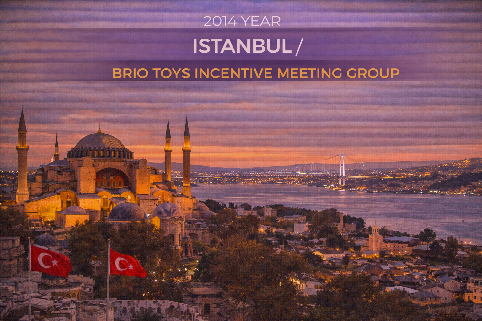 Istanbul, Turkey: Sunset over the Hagia Sophia and Bosphorus Strait, with Turkish flags.