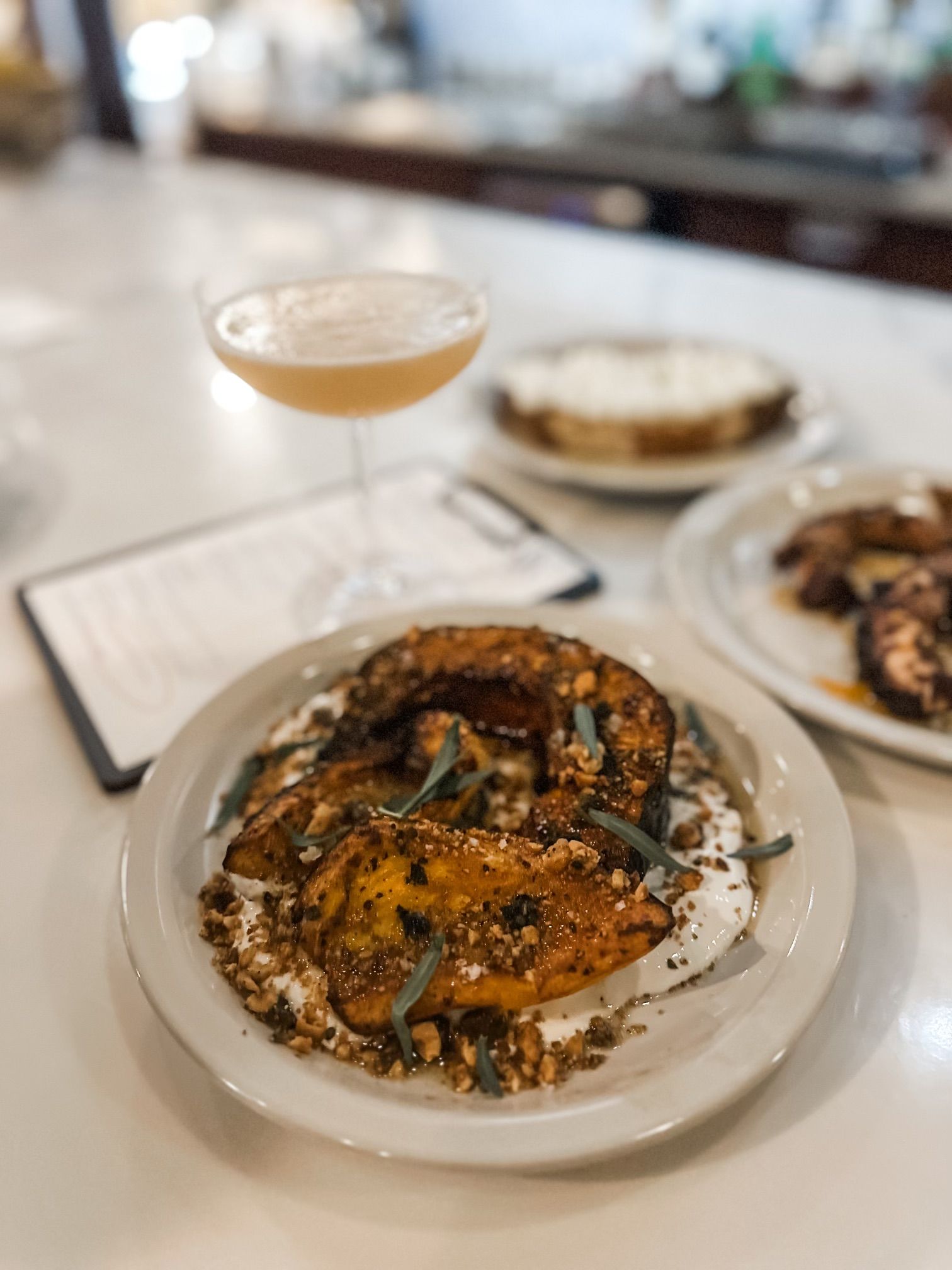 Indulge in the New Dinner Menu & Savor Tasty Cocktails Available at Belly Market in Columbia, MO.