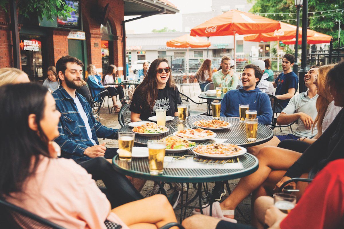 The Savor Columbia Interns Enjoy Warm Days & Good Food on the Patio at Shiloh’s in Columbia, MO.