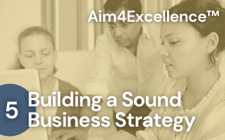 A group of people looking at a computer screen with the words