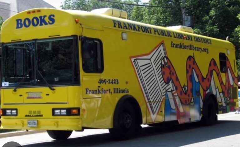A yellow bus that says books on the side