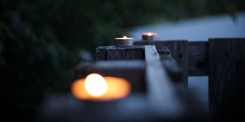 Glowing candles symbolizing peace and remembrance for funeral and cremation services in Petaluma, CA