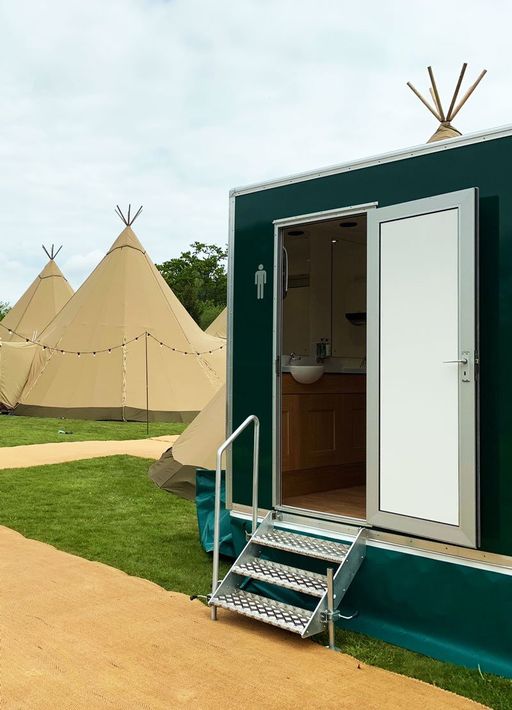 luxury toilet hire at a party with indian wigwam tents