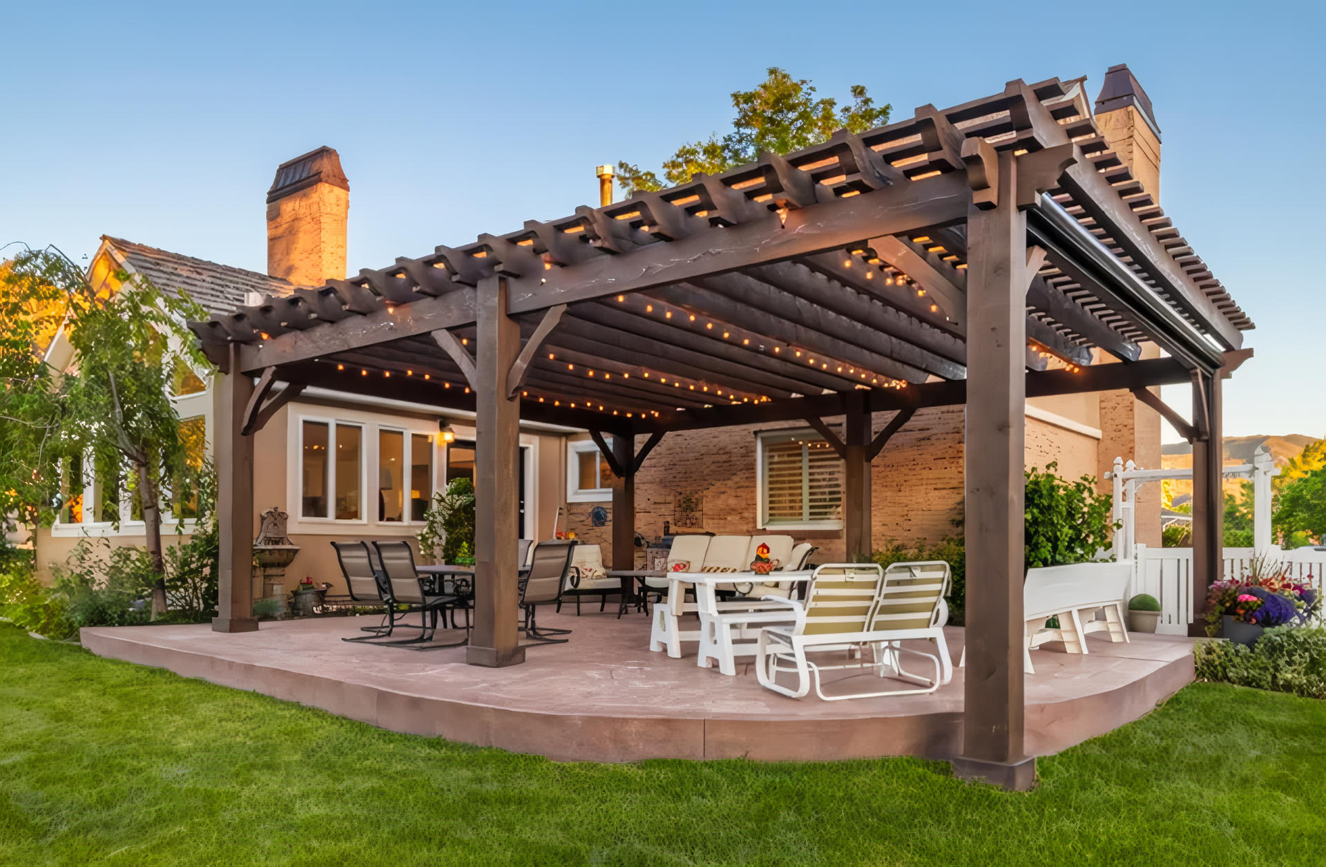 A wooden pergola with a view of a forest.