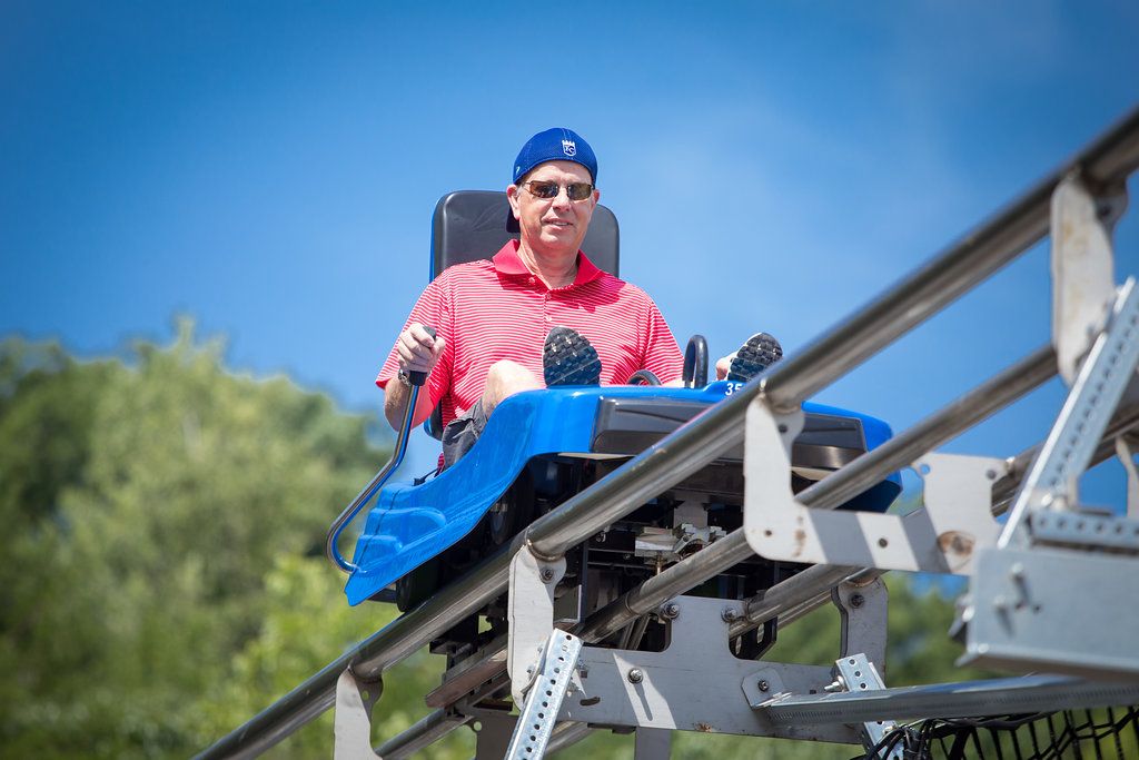 person riding an alpine coaster