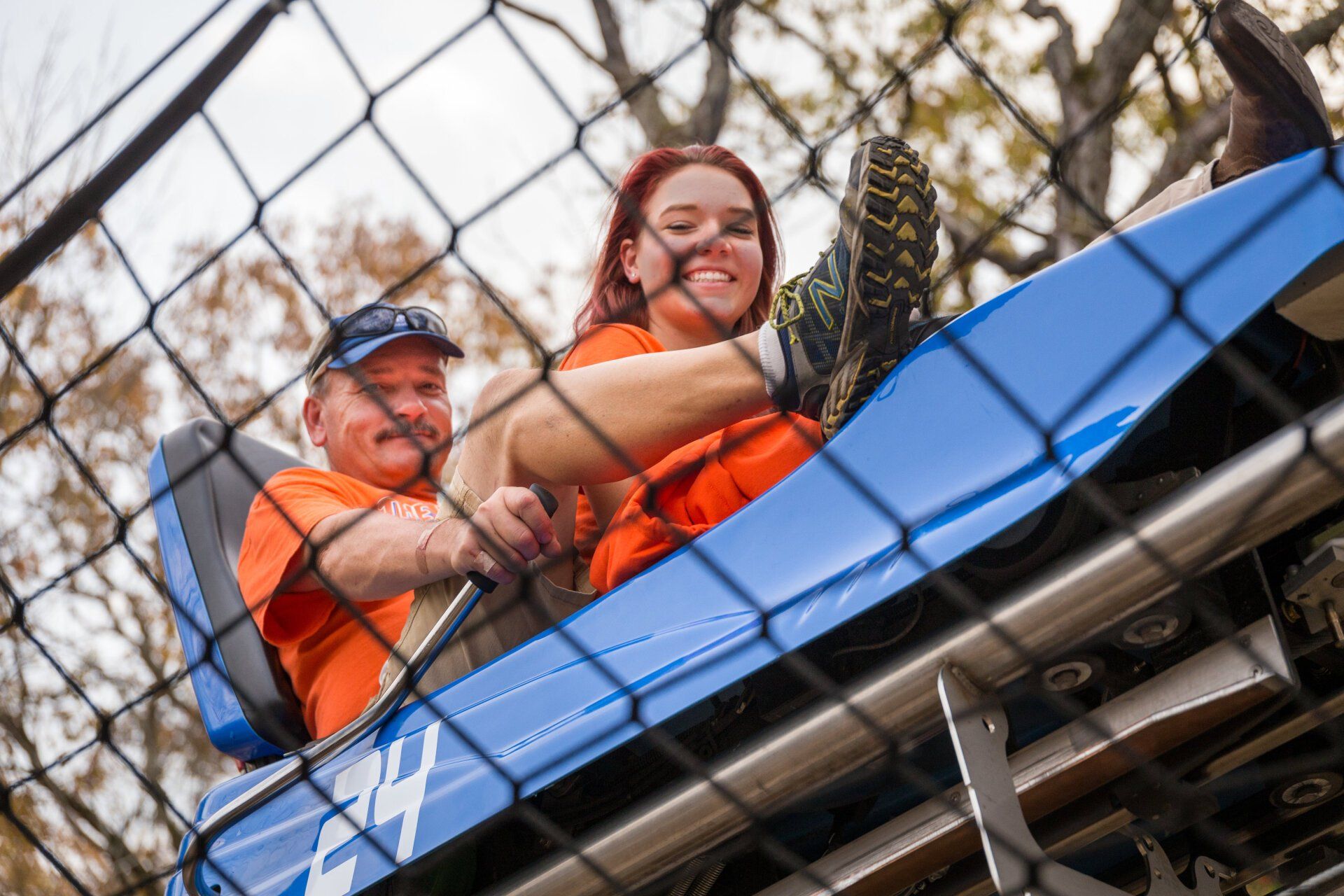 a couple on a mountain coaster