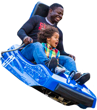Father and daughter riding in coaster