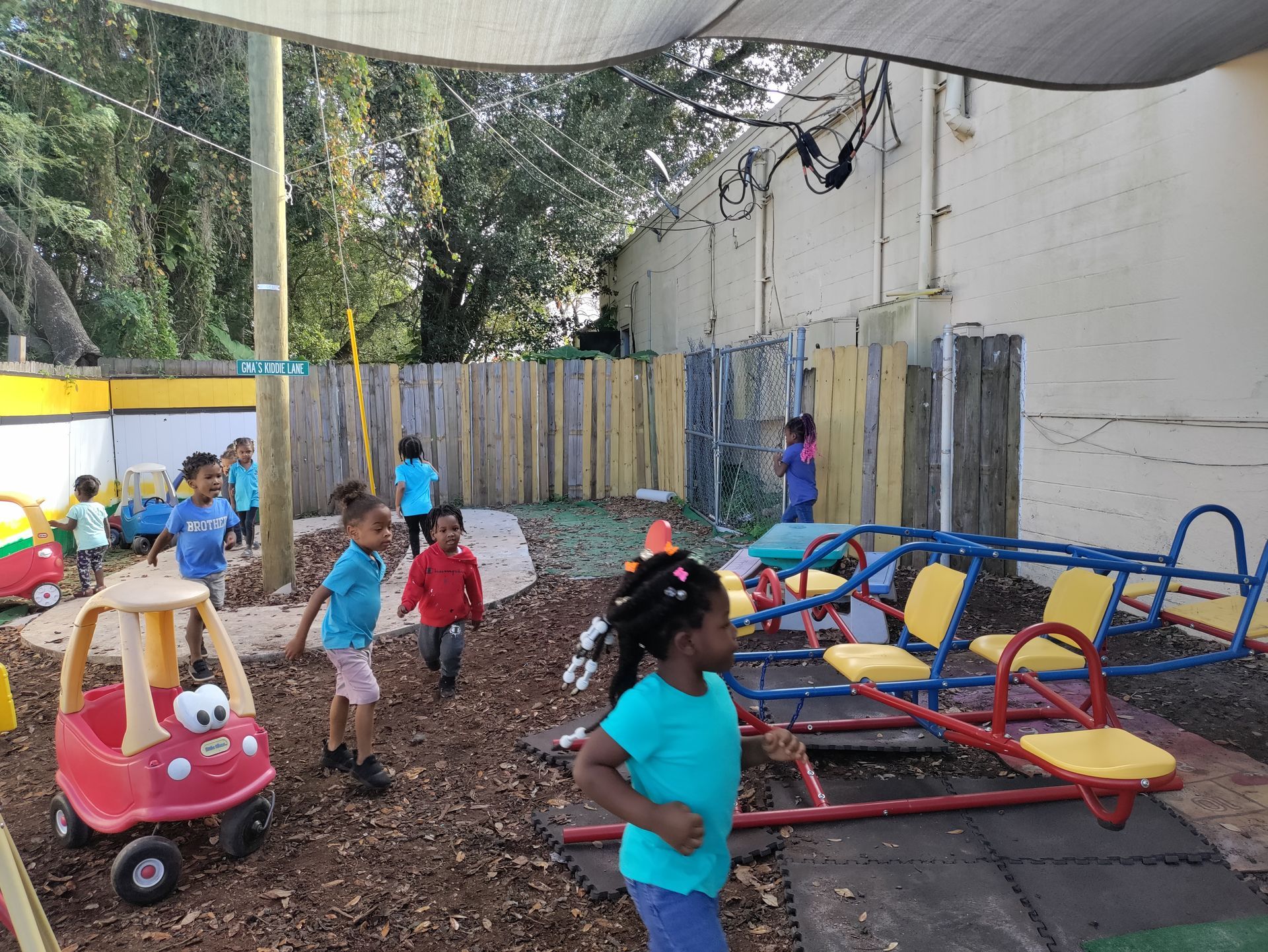 A group of children are playing in a playground.