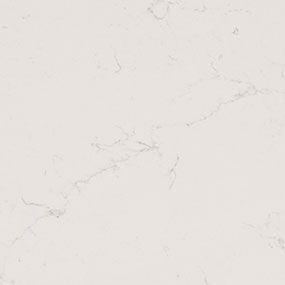 A close up of a white marble counter top.