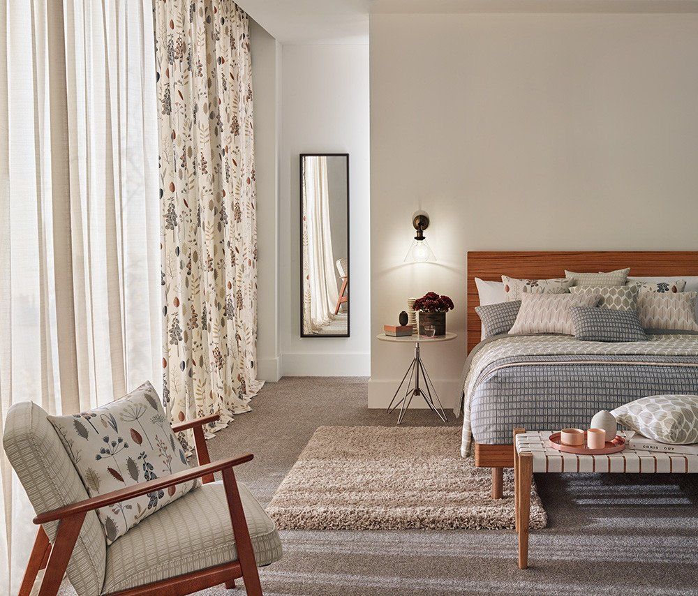 Bright white curtains with floral pattern