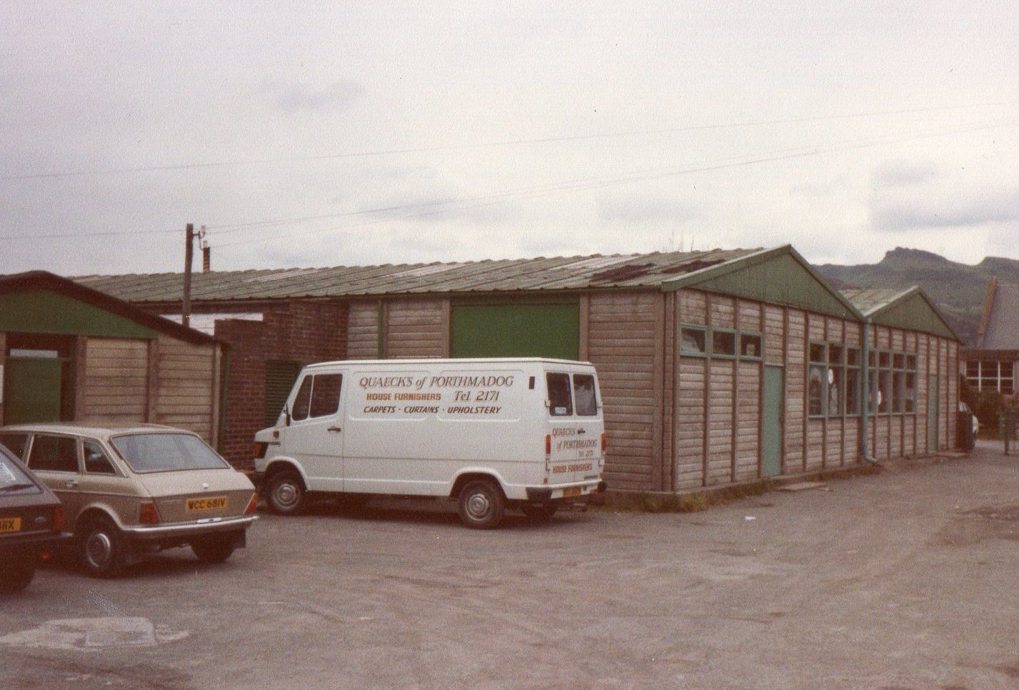 Old Quaeck's Furnishers van parked outside factory