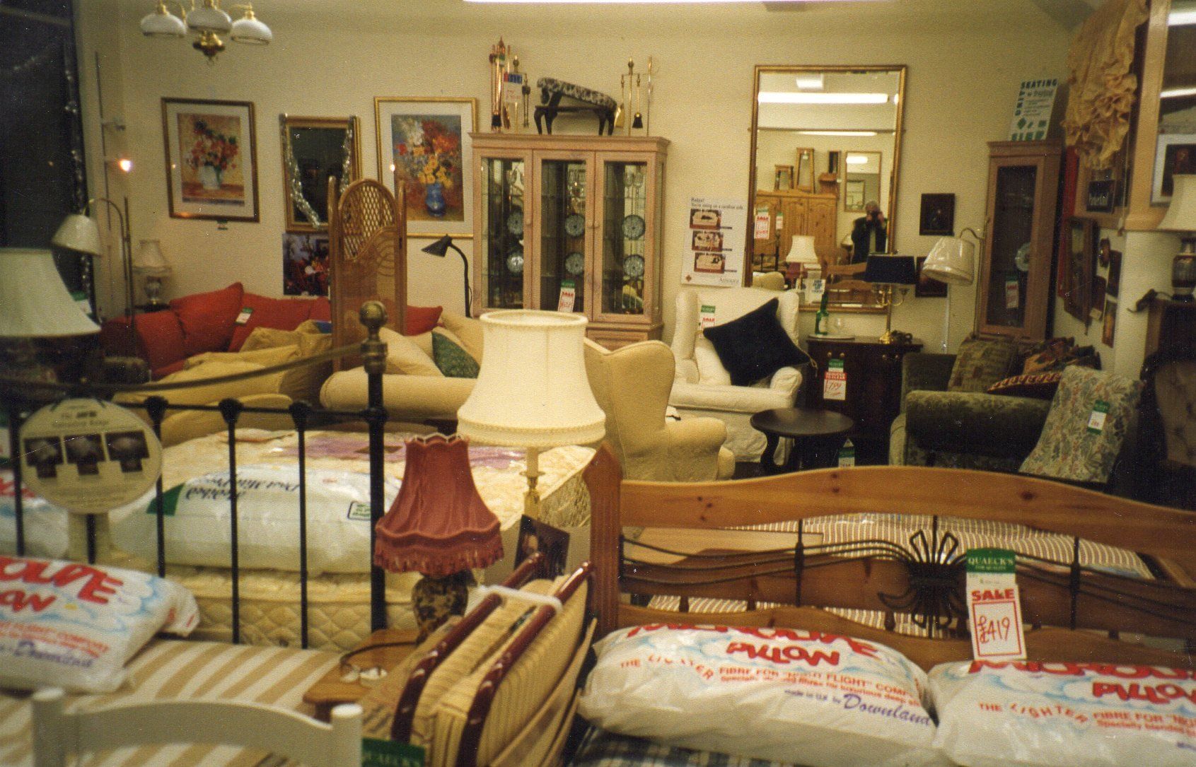 Bed and chairs on display at Quaeck's
