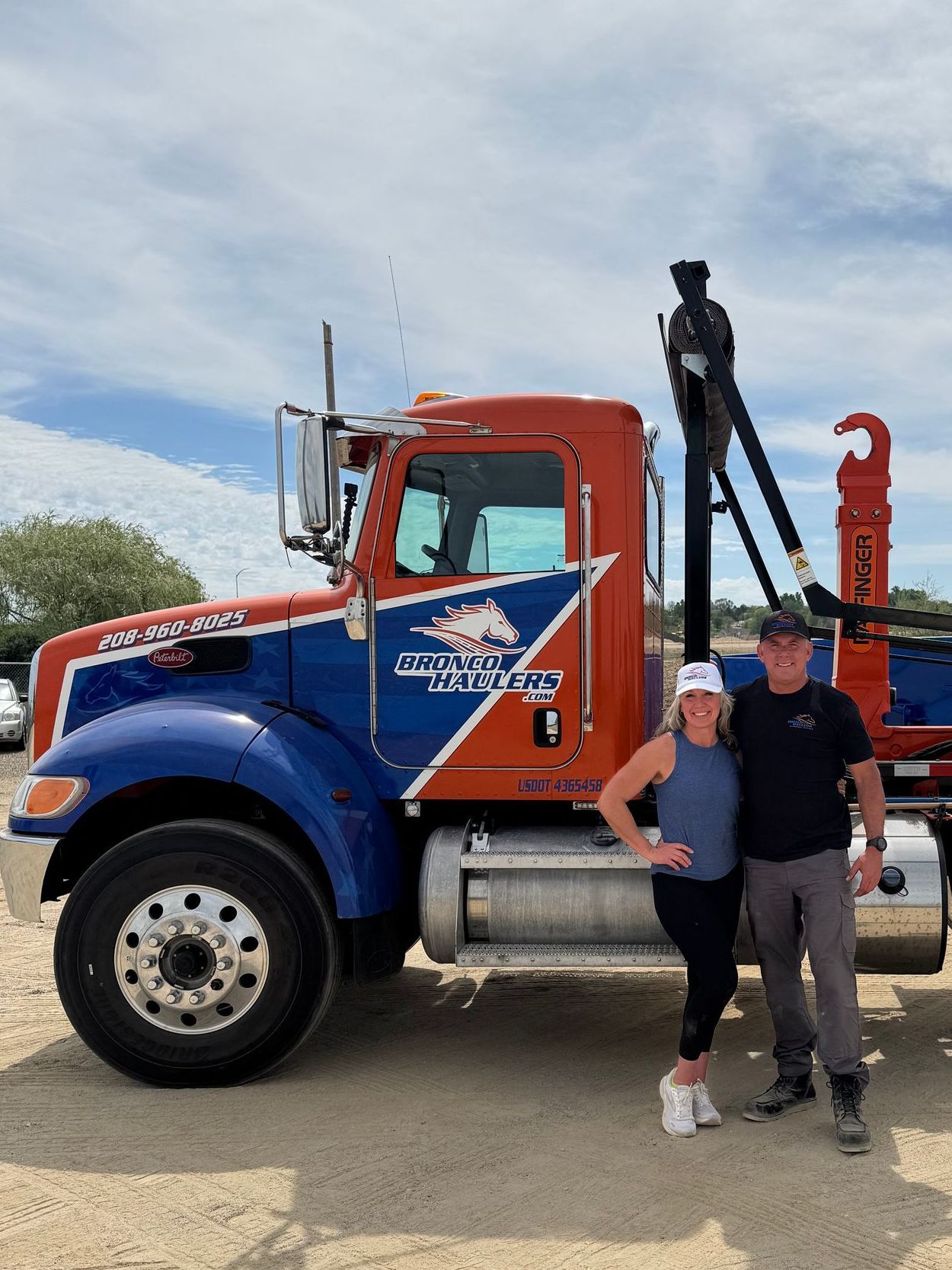 Picture of Mark and Chandra Schreck, the owners of Bronco Haulers