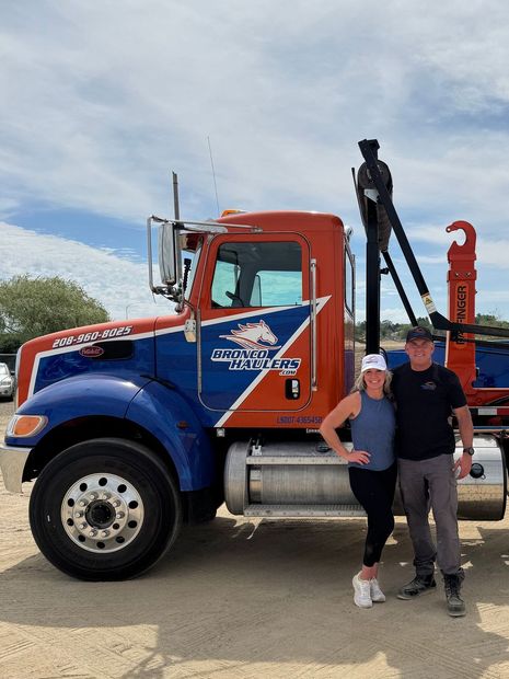 Picture of Mark and Chandra Schreck, the owners of Bronco Haulers