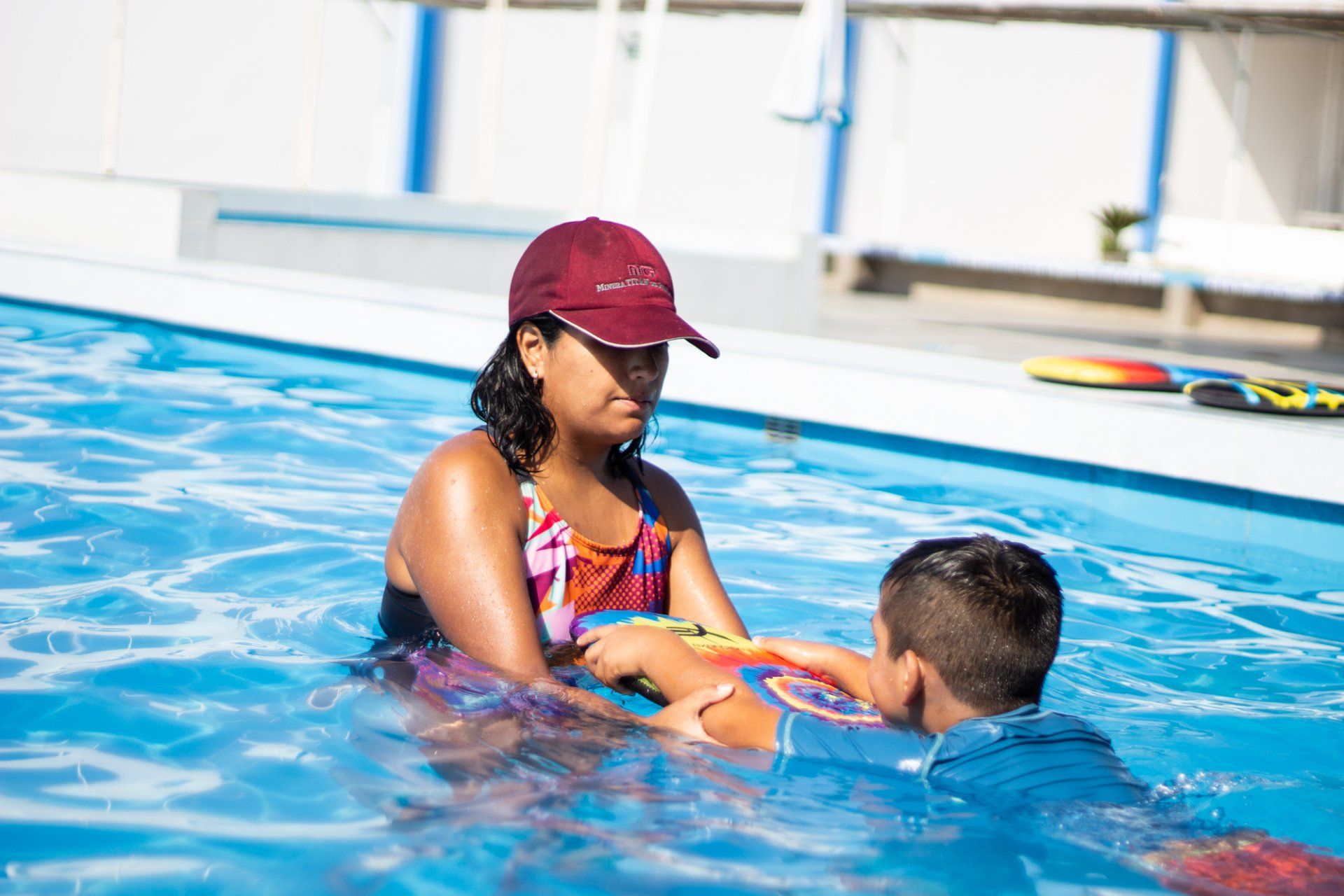 An Otra Cosa volunteer teaching local children how to swim in Huanchaco, Peru.