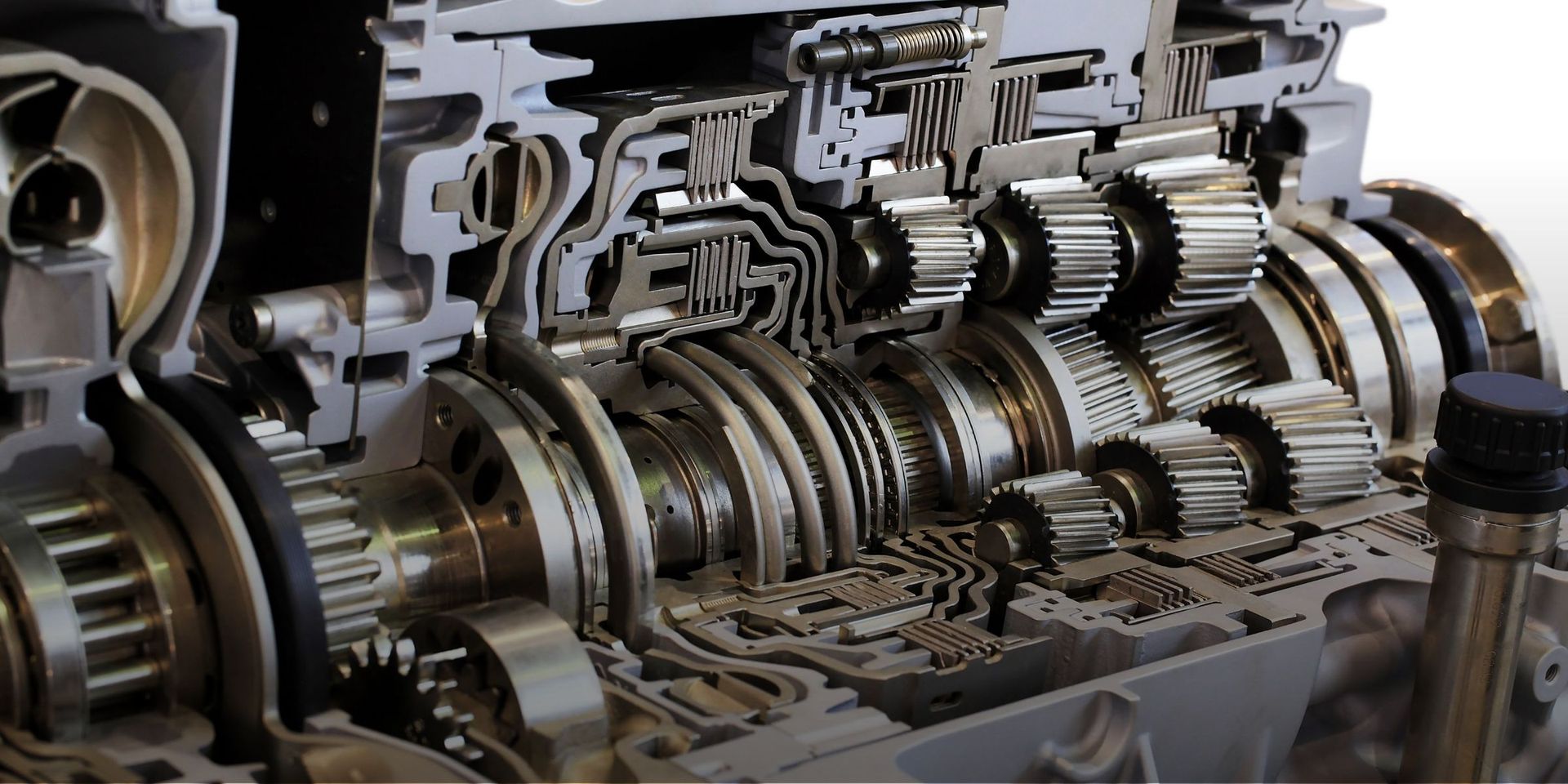 Car undercarriage inspection for rattling transmission noise — America’s Service Station Alpharetta